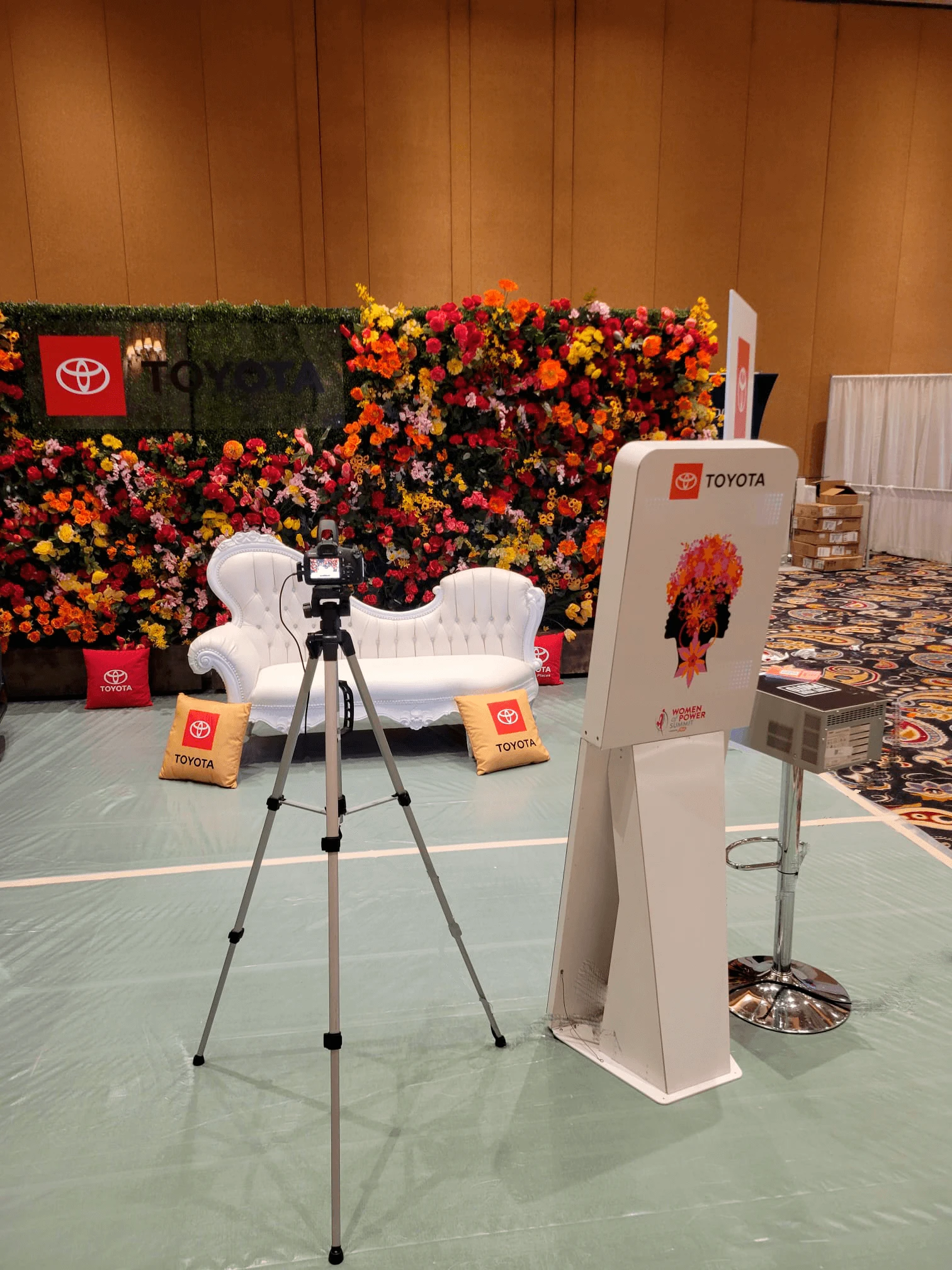 Toyota flower wall photo booth setup